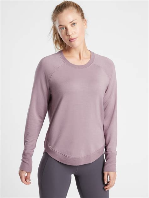 Shop Athleta&39;s Purana Wrap Sweatshirt FOR To and from yoga practice and studio workouts, FEEL Nirvana is the softest fabric imaginable, FAVE Front wrap detail for a cozy fit, Hidden side pockets store your essentials, Oversized edge for a drapey, cozy fit, 486073. . Athleta sweatshirts